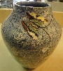 Vase bleu avec papillons vert